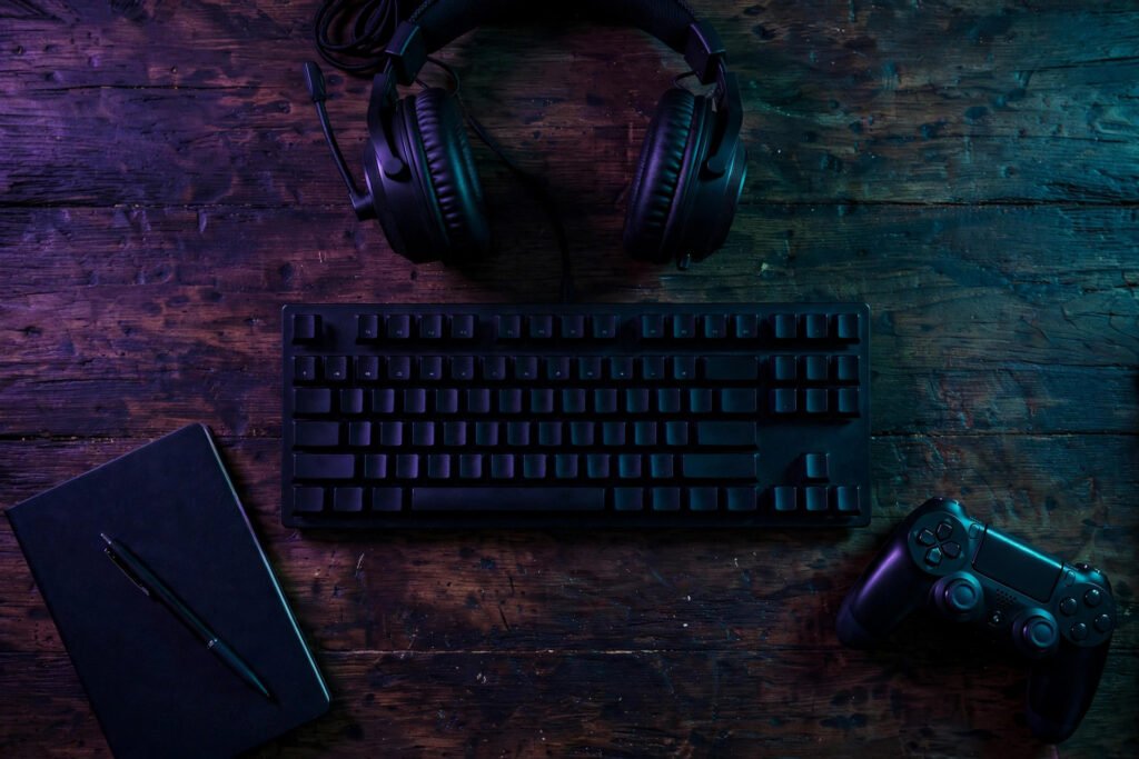 Flat lay of gaming gear for players learning how to pick a gamertag in 2026