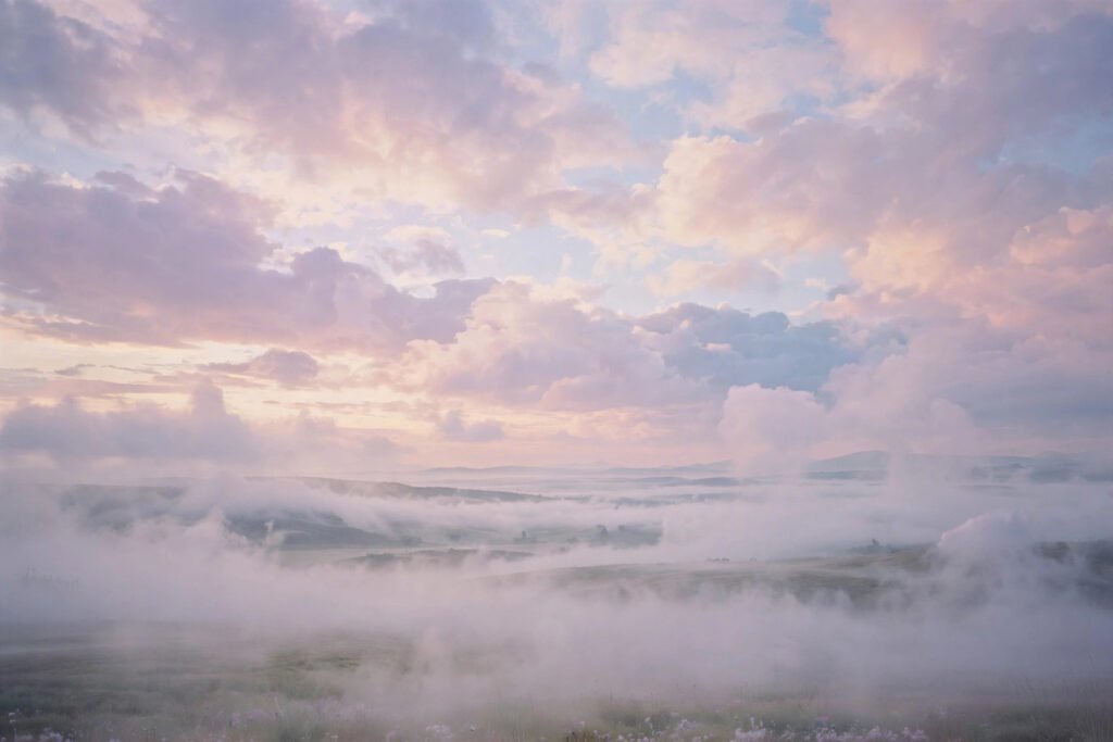 Dreamy pastel indie usernames floating in a soft cloudy sky